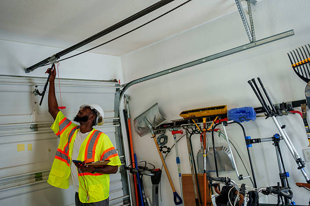 Professional Garage Door Installation technician working in Laurel, MT